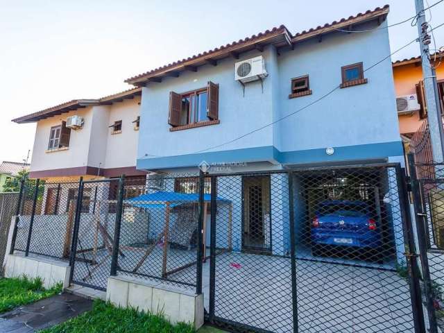 Casa em condomínio fechado com 3 quartos à venda na Rua Maria Elaine Wotter, 26, Rubem Berta, Porto Alegre, 135 m2 por R$ 425.000