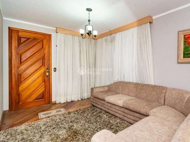 Casa com 3 quartos à venda na Rua Vicente Marsiglia Filho, 206, Jardim Leopoldina, Porto Alegre, 200 m2 por R$ 655.000