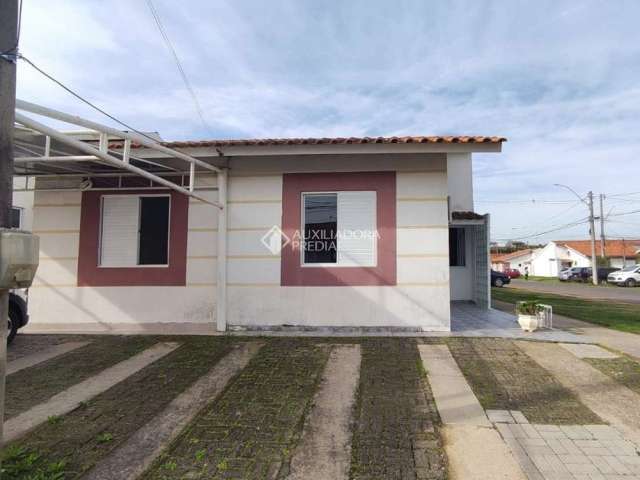 Casa em condomínio fechado com 3 quartos à venda na Acesso Terra Nova, 601, Terra Nova, Alvorada, 51 m2 por R$ 245.000