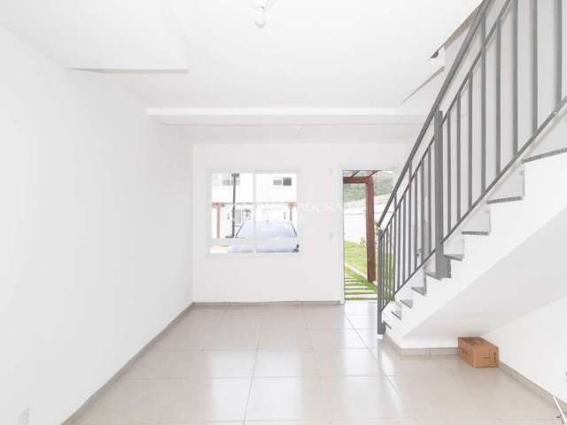 Casa em condomínio fechado com 2 quartos para alugar na Estrada Cristiano Kraemer, 5038, Vila Nova, Porto Alegre, 81 m2 por R$ 2.000