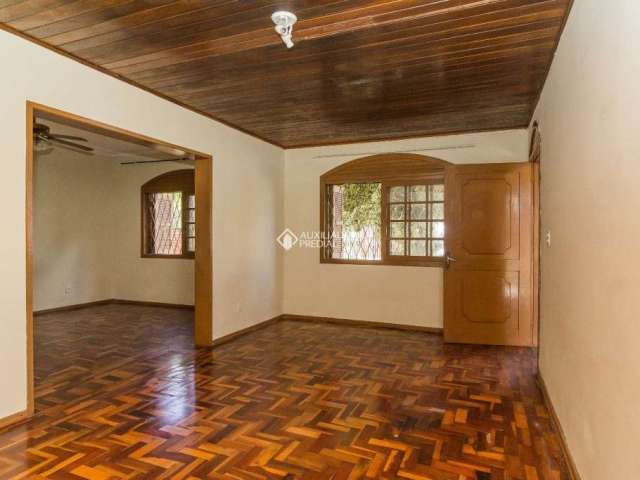 Casa em condomínio fechado com 4 quartos para alugar na DAVI JOSE ESTRELA, 44, Sarandi, Porto Alegre, 280 m2 por R$ 2.500