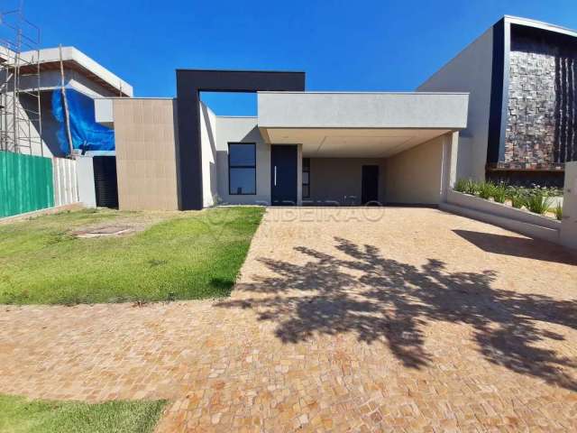 Casa térrea em condomínio no Bairro Quinta dos Ventos , 03 suítes  com armários planejados, piscina e churrasqueira.