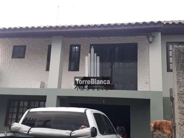 Casa com 3 dormitórios à venda no Bairro Periquitos