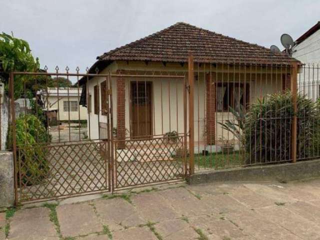 Vendo Terreno com 400m² com 2 casas com dois dormitórios cada.