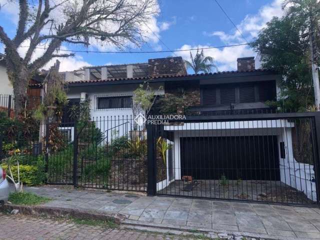Casa com 4 quartos à venda na Rua Professor Fernando Carneiro, 102, Três Figueiras, Porto Alegre, 360 m2 por R$ 1.450.000