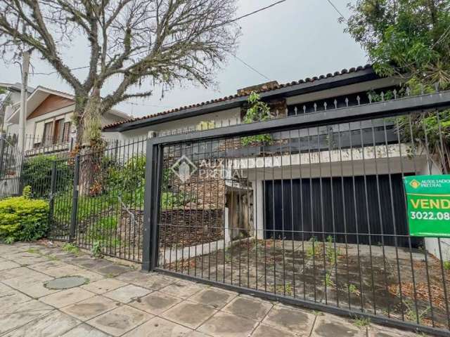 Casa com 4 quartos à venda na Rua Professor Fernando Carneiro, 102, Três Figueiras, Porto Alegre, 360 m2 por R$ 1.450.000