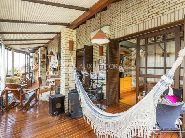Casa em condomínio fechado com 4 quartos à venda na Rua Erechim, 100, Nonoai, Porto Alegre, 331 m2 por R$ 1.050.000