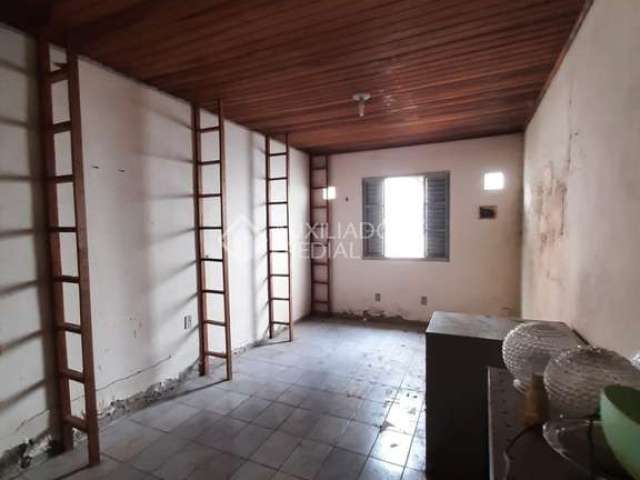 Casa com 4 quartos à venda na Avenida Felipe Weimann, 98, Santa Tereza, Porto Alegre, 180 m2 por R$ 298.000