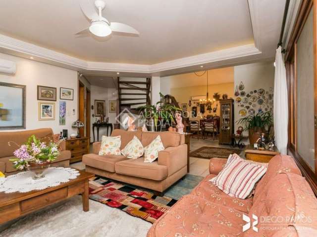 Casa em condomínio fechado com 3 quartos à venda na Rua Adriano Pereira da Silva, 311, Vila Nova, Porto Alegre, 389 m2 por R$ 1.330.000