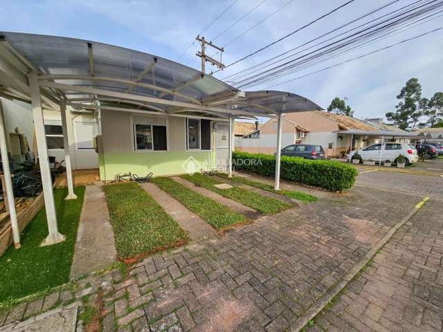 Casa em condomínio fechado com 3 quartos à venda na Rua Brigadeiro Ivo Borges, 1000, São Luis, Canoas, 62 m2 por R$ 295.000