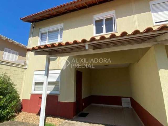 Casa em condomínio fechado com 3 quartos à venda na Rua República, 2708, Harmonia, Canoas, 88 m2 por R$ 380.000