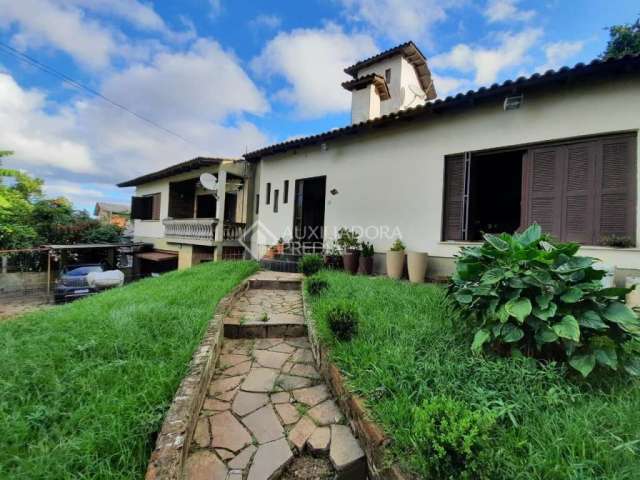 Casa em condomínio fechado com 5 quartos à venda na Rua São Cristiano, 67, Santa Tereza, Porto Alegre, 399 m2 por R$ 750.000