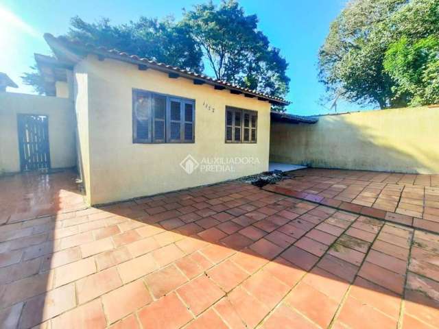 Casa em condomínio fechado com 3 quartos à venda na Rua Princesa Isabel, 1183, Fátima, Canoas, 130 m2 por R$ 270.000