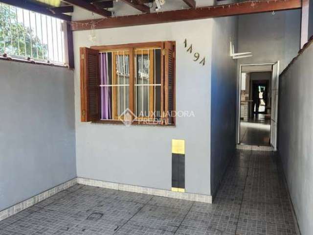 Casa com 3 quartos à venda na Rua Pedro Cláudio Monassa, 1494, Jardim Algarve, Alvorada, 70 m2 por R$ 219.900