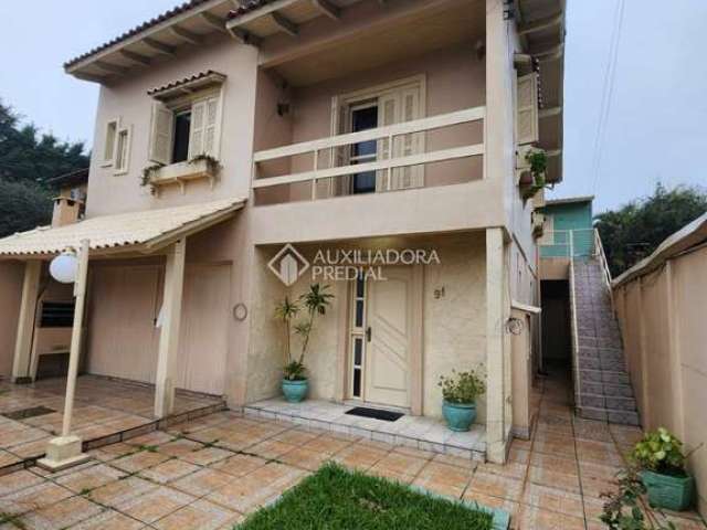 Casa com 3 quartos à venda na Rua Recife, 91, Sumaré, Alvorada, 250 m2 por R$ 600.000