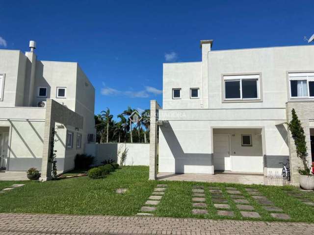 Casa em condomínio fechado com 3 quartos à venda na Av. José Bruno Klein, 667, Centro, Xangri-Lá, 119 m2 por R$ 858.000