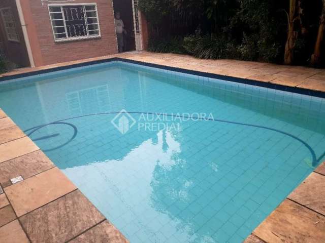 Casa com 3 quartos à venda na Rua Antônio Tessera, 168, Tristeza, Porto Alegre, 363 m2 por R$ 900.000