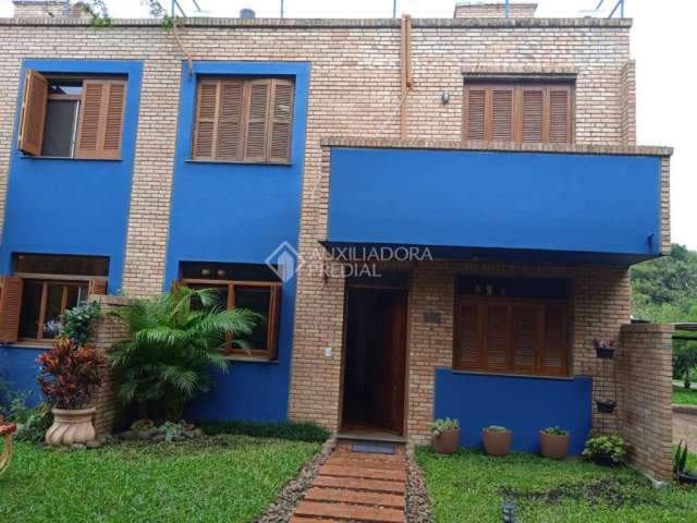 Casa em condomínio fechado com 3 quartos à venda na Rua Amapá, 919, Vila Nova, Porto Alegre, 148 m2 por R$ 775.000