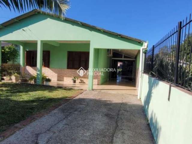 Casa com 3 quartos à venda na MAURA­CIO LESSA, 735, Flórida, Guaíba, 114 m2 por R$ 430.000