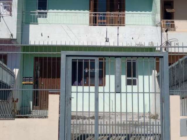 Casa com 3 quartos à venda na VASCO ALVES PEREIRA, 9, Morada da Colina, Guaíba, 99 m2 por R$ 380.000