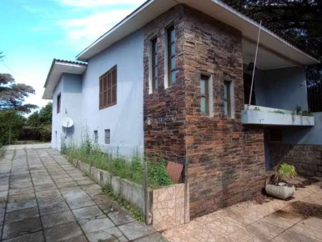 Casa com 5 quartos à venda na Avenida Farroupilha, 316, Flórida, Guaíba, 200 m2 por R$ 450.000