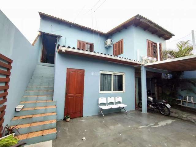 Casa com 6 quartos à venda na TRES (LOT NEIWA), 185, Flórida, Guaíba, 260 m2 por R$ 380.000