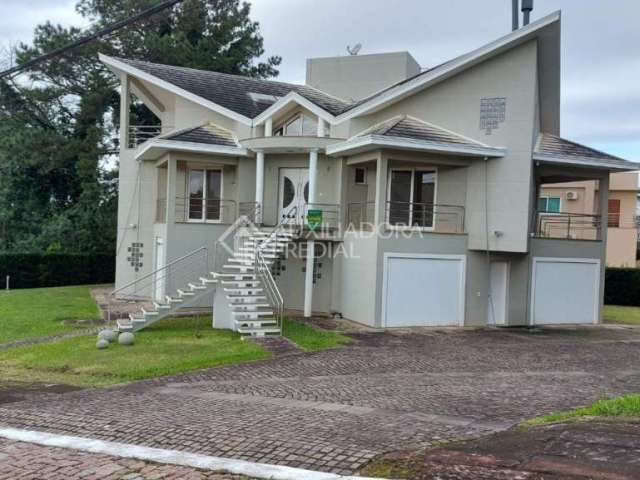 Casa em condomínio fechado com 3 quartos à venda na BORREGARD, 19, Alegria, Guaíba, 387 m2 por R$ 1.500.000