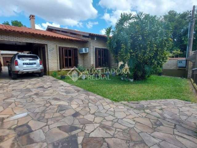 Casa com 3 quartos à venda na Rua José Stortti, 352, Centro, Guaíba, 150 m2 por R$ 900.000