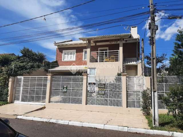 Casa em condomínio fechado com 3 quartos à venda na Rua das Timbaúvas, 76, Igara, Canoas, 280 m2 por R$ 1.600.000