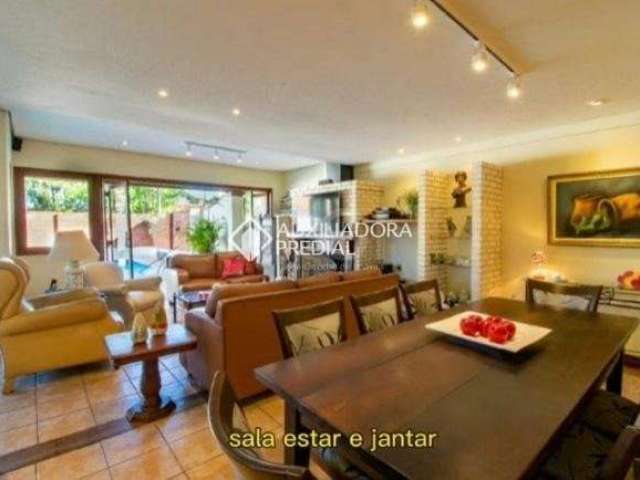 Casa com 4 quartos à venda na Rua Coronel João Leite Filho, 125, Jardim Isabel, Porto Alegre, 280 m2 por R$ 1.150.000