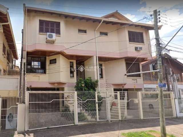 Casa com 3 quartos à venda na Travessa Olintho Sanmartin, 30, Vila Ipiranga, Porto Alegre, 180 m2 por R$ 800.000