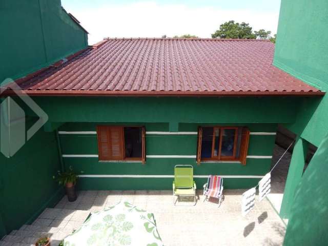 Casa em condomínio fechado com 3 quartos à venda na Rua Cantegril, 645, Jardim Krahe, Viamão, 100 m2 por R$ 310.000