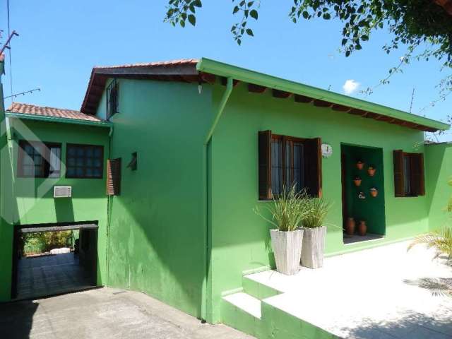 Casa em condomínio fechado com 4 quartos à venda na Rua Nápoli, 71, Santa Isabel, Viamão, 249 m2 por R$ 550.000