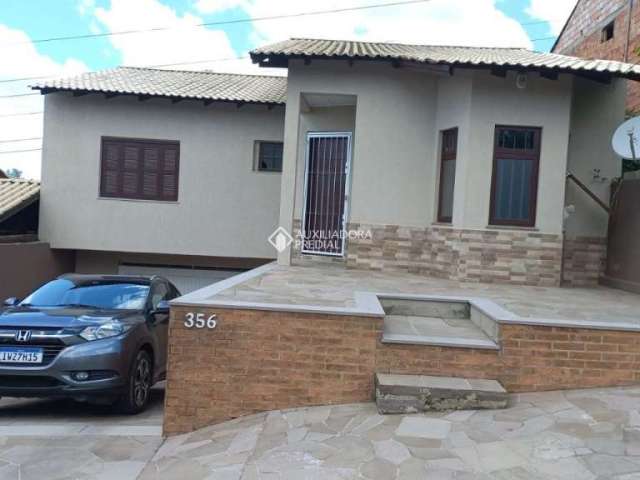 Casa em condomínio fechado com 3 quartos à venda na Rua Monza, 356, Santa Isabel, Viamão, 156 m2 por R$ 440.000