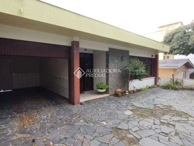 Casa com 4 quartos à venda na Avenida Engenheiro Ludolfo Boehl, 461, Teresópolis, Porto Alegre, 243 m2 por R$ 730.000