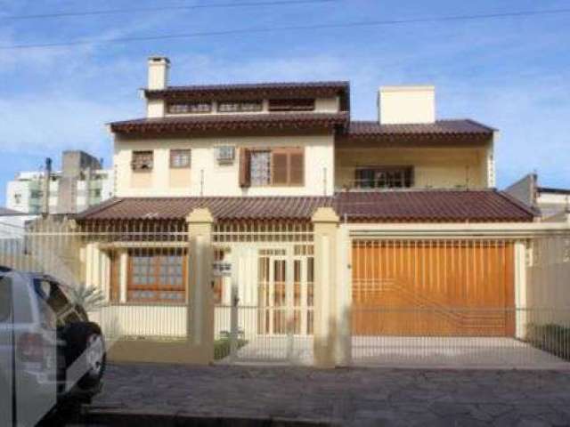 Casa com 4 quartos à venda na Rua Alfredo Silveira Dias, 15, Nonoai, Porto Alegre, 342 m2 por R$ 1.080.000