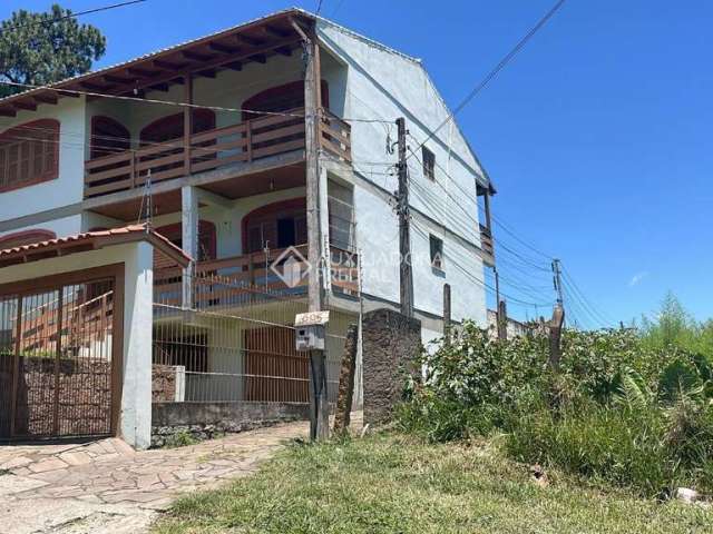 Casa com 1 quarto à venda na Rua Taveira Júnior, 471, Nonoai, Porto Alegre, 2500 m2 por R$ 1.200.000