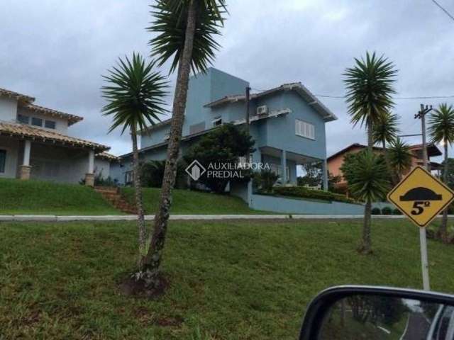 Casa em condomínio fechado com 5 quartos à venda na Estrada Capitão Gentil Machado de Godoy, 4500, Vila Elsa, Viamão, 250 m2 por R$ 1.200.000