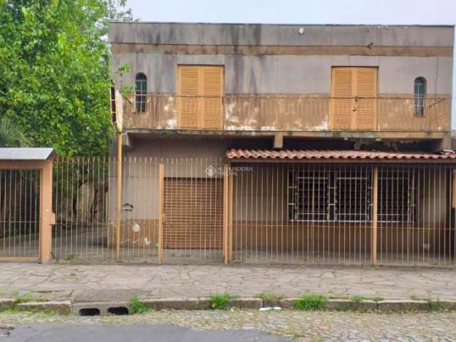 Casa com 4 quartos à venda na Rua Professor Guerreiro Lima, 41, Partenon, Porto Alegre, 450 m2 por R$ 700.000