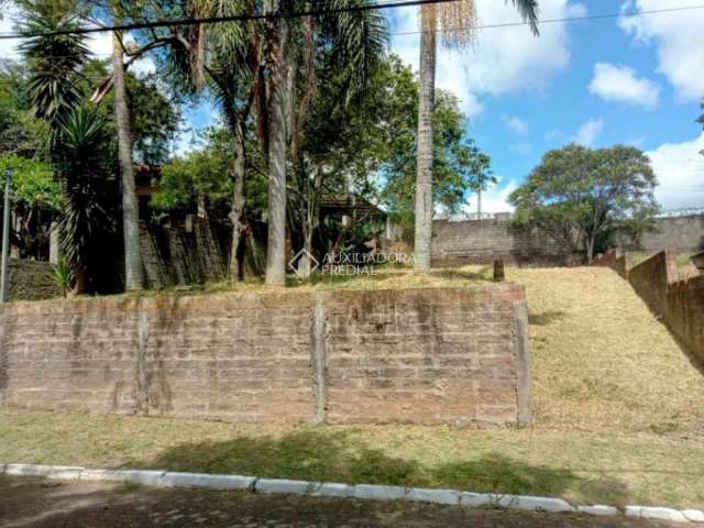 Terreno em condomínio fechado à venda na Rua dos Ipês Roxo, 12, Tarumã, Viamão, 384 m2 por R$ 140.000