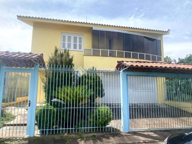 Casa em condomínio fechado com 4 quartos à venda na Rua Cinamomo, 109, São Lucas, Viamão, 269 m2 por R$ 850.000