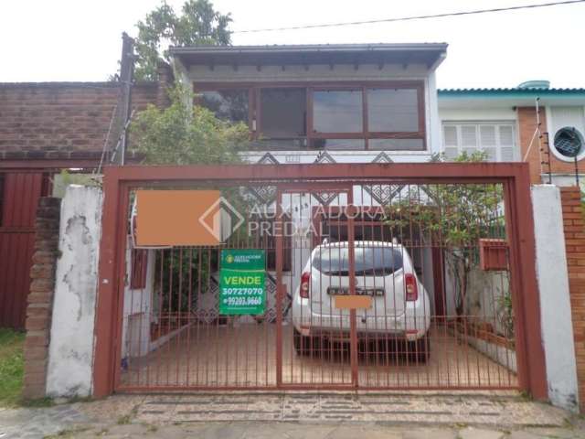 Casa em condomínio fechado com 4 quartos à venda na Rua Veríssimo Rosa, 368, Partenon, Porto Alegre, 120 m2 por R$ 680.000