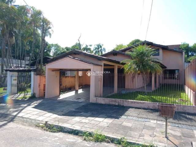 Casa com 3 quartos à venda na Rua Cruz Alta, 294, Centro, Esteio, 567 m2 por R$ 699.000