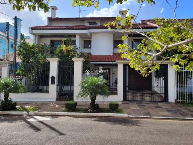 Casa com 6 quartos à venda na Rua Irmão Agnelo Chaves, 170, Marechal Rondon, Canoas, 448 m2 por R$ 1.730.000