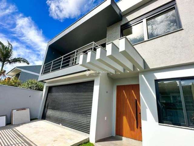 Casa com 3 quartos à venda na Rua Doutor David Giacomini, 103, Estância Velha, Canoas, 221 m2 por R$ 1.440.000