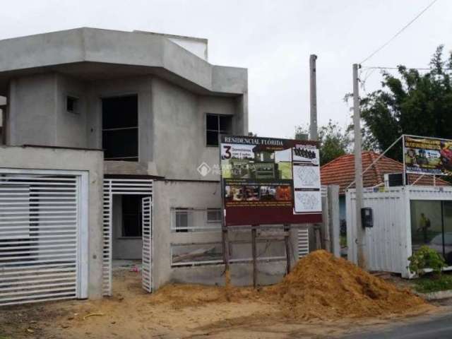 Casa em condomínio fechado com 3 quartos à venda na Rua Buttenbender, 296, Fátima, Canoas, 147 m2 por R$ 479.900