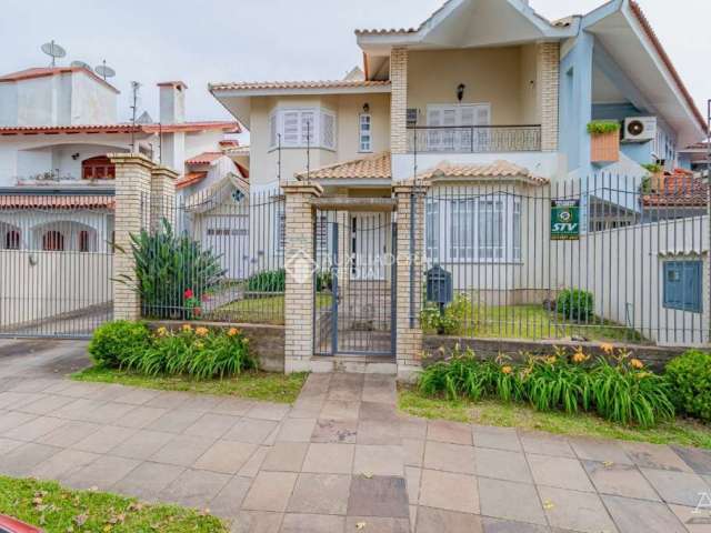 Casa com 4 quartos à venda na Avenida Doutor Sezefredo Azambuja Vieira, 162, Marechal Rondon, Canoas, 271 m2 por R$ 2.350.000
