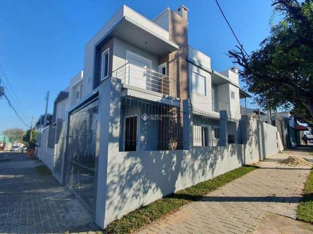 Casa com 3 quartos à venda na Rua Érico Veríssimo, 53, Nossa Senhora das Graças, Canoas, 132 m2 por R$ 780.000