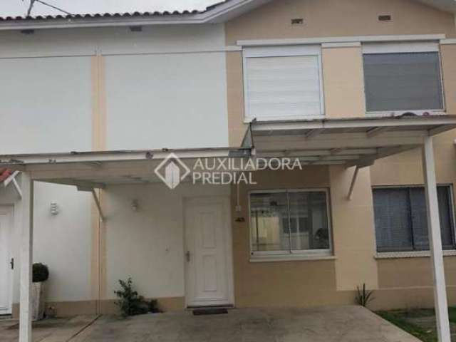 Casa em condomínio fechado com 2 quartos à venda na Rua Aurora, 1100, Marechal Rondon, Canoas, 109 m2 por R$ 570.000