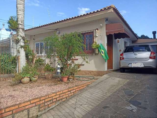 Casa com 5 quartos à venda na Rua General Salustiano, 205, Marechal Rondon, Canoas por R$ 970.000